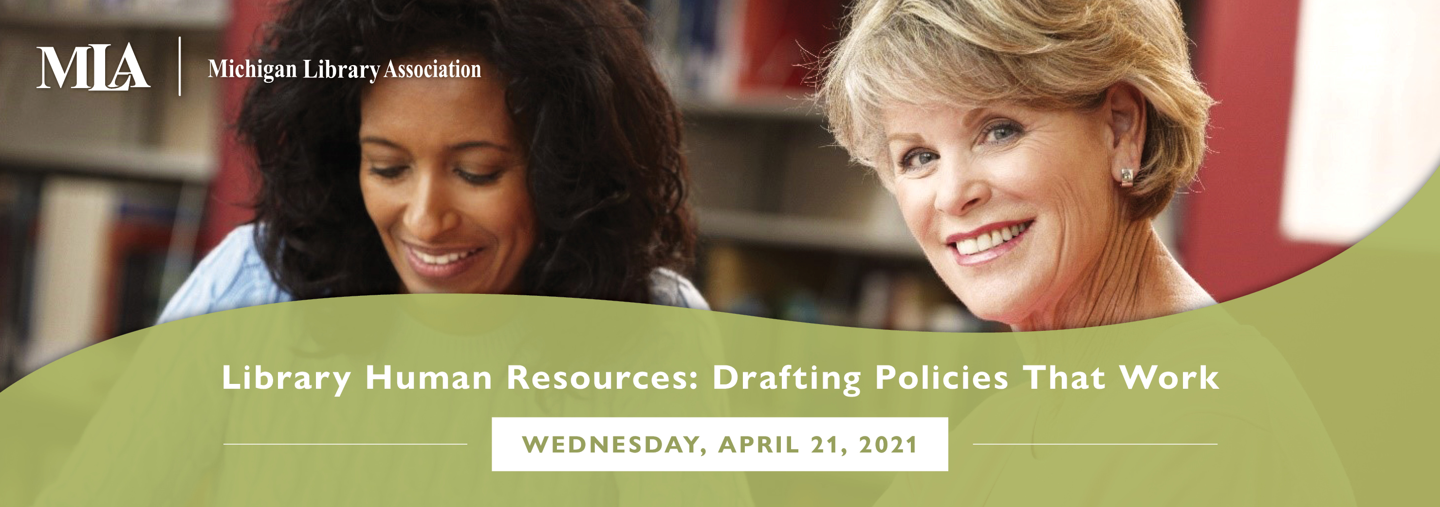 Library Human Resources event image. Photo shows two individuals seated and smiling at camera.